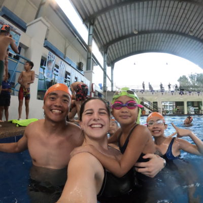 Swimmer Bri Leverenz with swim students