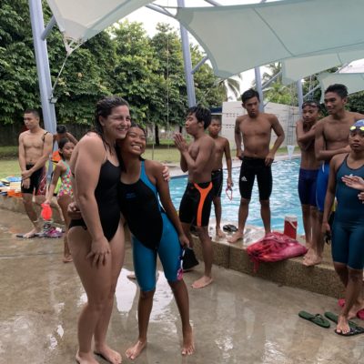 Swimmer Bri Leverenz with swim students