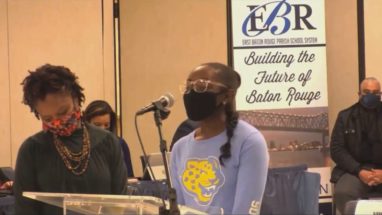Aubrion James accepts recognition from VIPS for AFH U programming