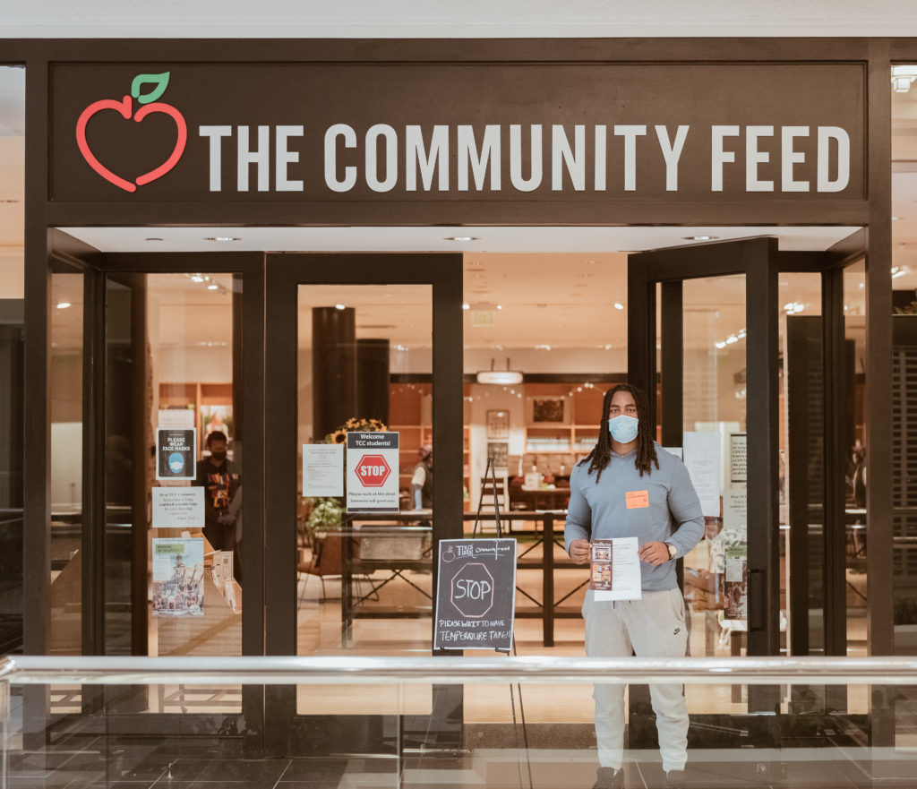 Patrick Jones stands outside of The Community Feed food pantry after a volunteer visit.