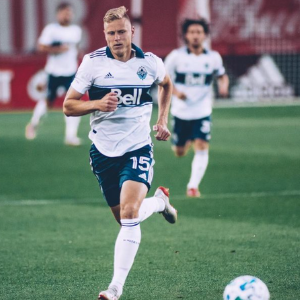 Seattle Sounders Assistant Coach Andy Rose playing soccer.