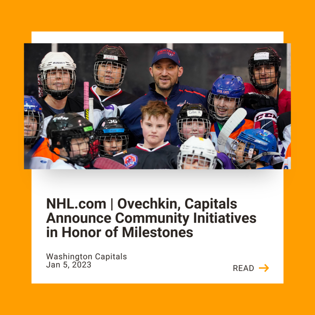 Alex Ovechkin surrounded by youth hockey players