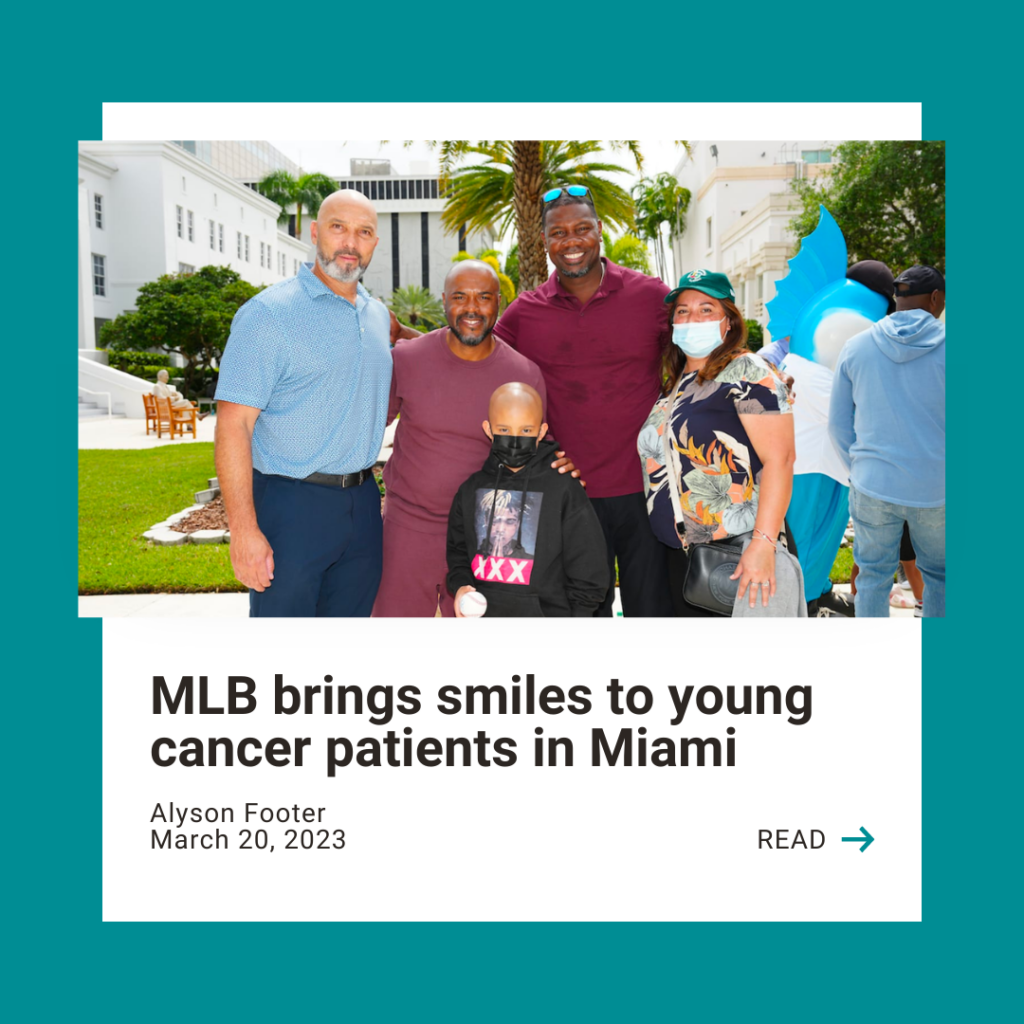Image shows three former MLB players (Raul Ibanez, Jimmy Rollins and Ryan Howard) with a mom and son at an outdoor hospital event. The Marlins mascot can be seen in the background. Text on image reads: MLB brings smiles to young cancer patients in Miami" with a call to action to click to read the article