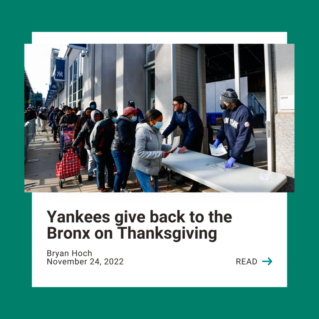 Image shows a line of people receiving flyers outside Yankee stadium. Text reads: "Yankees give back to the Bronx on Thanksgiving" with a call to action to read the full article by clicking the image.
