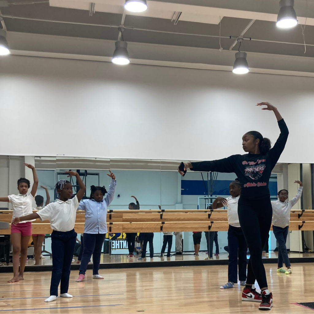 Zion Walters teaching a dance clinic at the Boys and Girls Club.