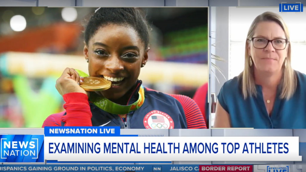 photo of AFH Chief Wellbeing Officer Suzanne Potts and Olympic Gymnast Simone Biles during the live news segment "Examining Mental Health Among Top Athletes"