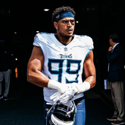 Photo of Rashad Weaver in his Tennessee Titans uniform leaving the tunnel at football practice