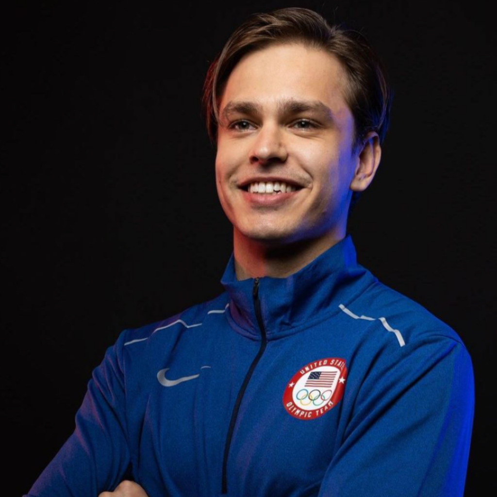 Photo of Andrew Mackiewicz smiling in his Team USA Olympic gear.