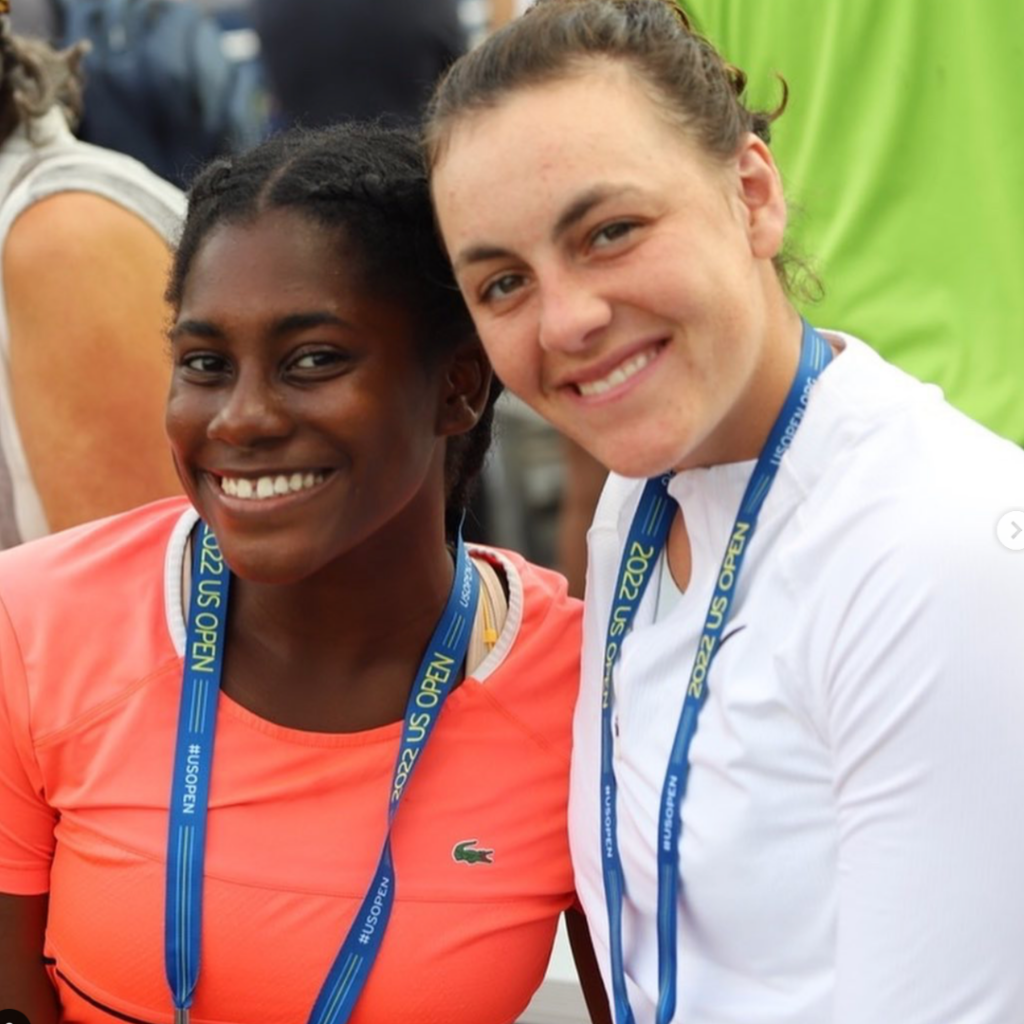 Ingrid Neel smiles next to Isis Gill at the 2022 U.S. Open.
